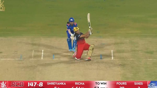 six-match-16-royal-challengers-bengaluru-vs-mumbai-indians-wpl-2026-richa-ghosh-six-6388337467112.Click to read full article.