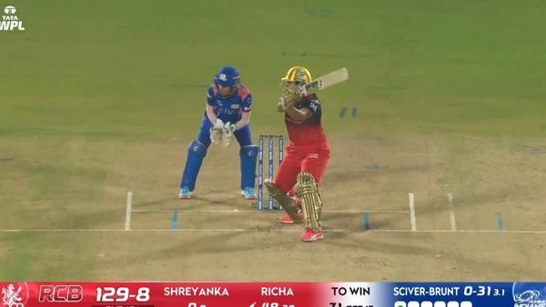 six-match-16-royal-challengers-bengaluru-vs-mumbai-indians-wpl-2026-richa-ghosh-six-6388336079112.Click to read full article.
