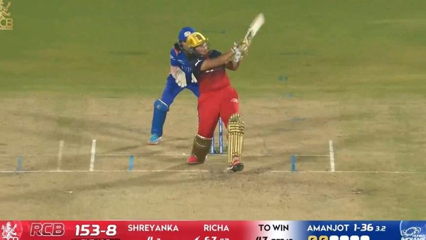 six-match-16-royal-challengers-bengaluru-vs-mumbai-indians-wpl-2026-richa-ghosh-six-6388334425112.Click to read full article.